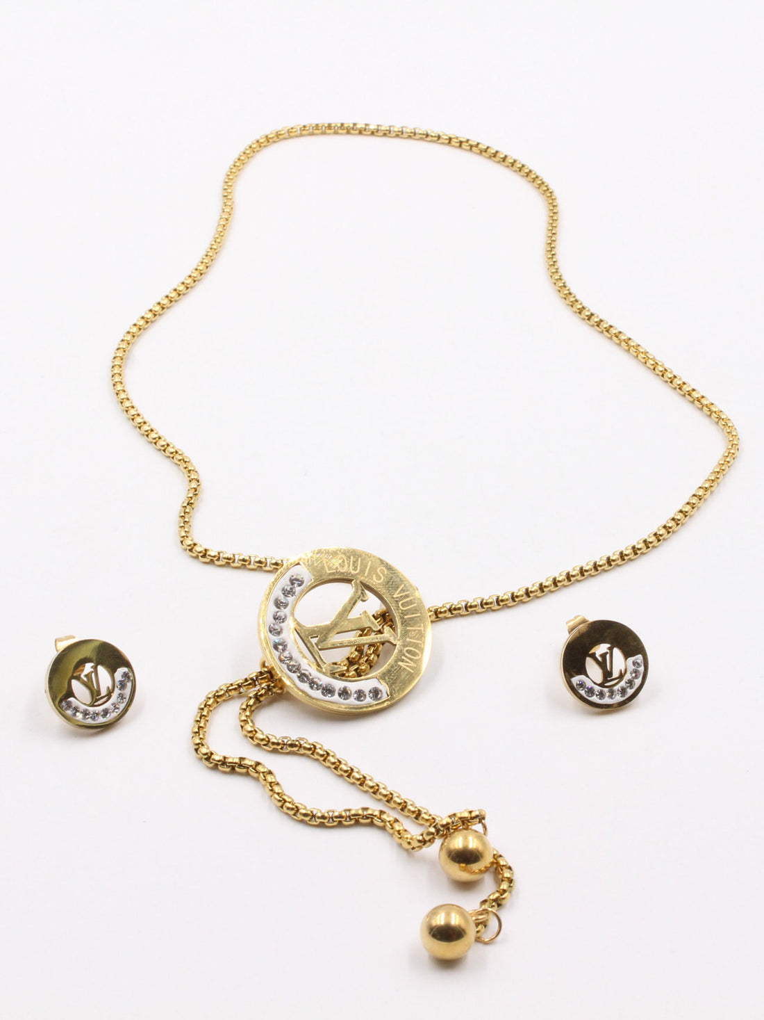 طقم لويس فيتون ذهبي سحاب اطقم louis vuitton ذهبي