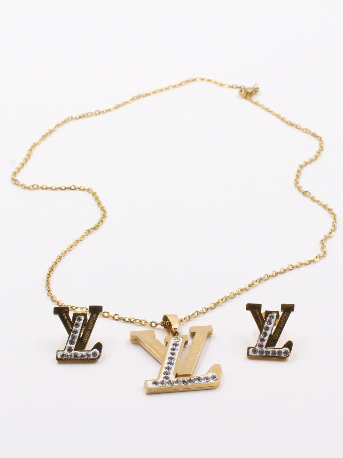 طقم لويس فيتون ذهبي وايت باكقراوند اطقم louis vuitton