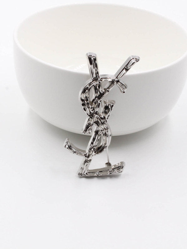 بروش ماركة ايف سان لوران كبير بروش ysl فضي