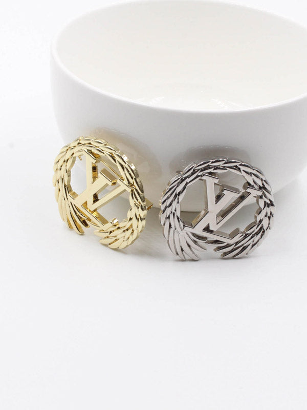 بروش ماركة لويس فيتون مدور ميتال بروش louis vuitton