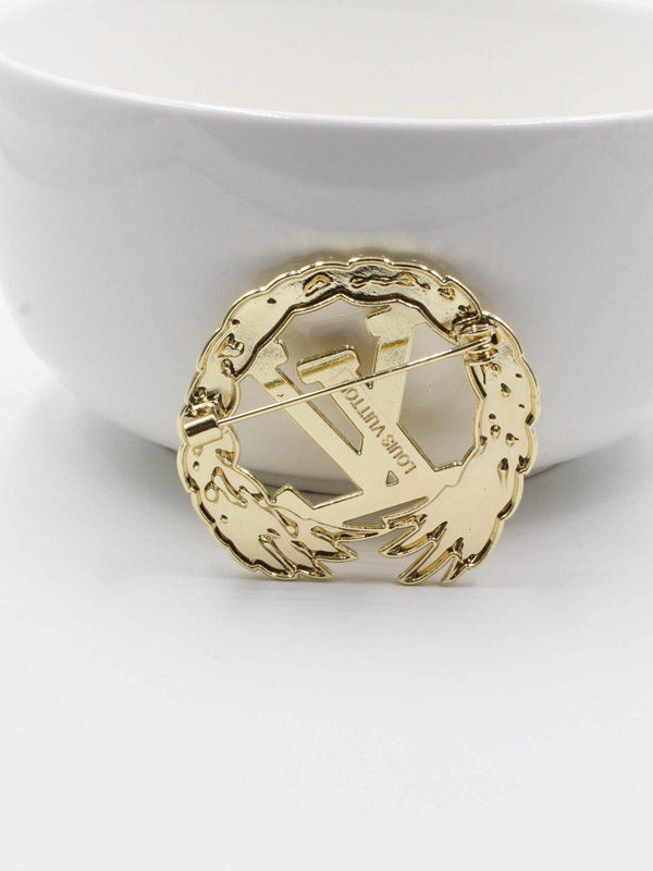 بروش ماركة لويس فيتون مدور ميتال بروش louis vuitton