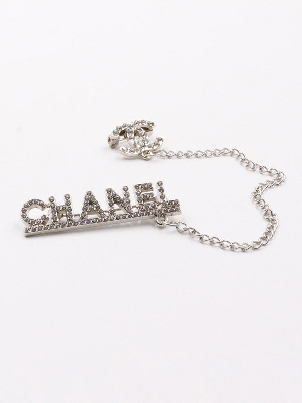 بروش ماركة شانيل كريستال سلسله بروش chanel فضي