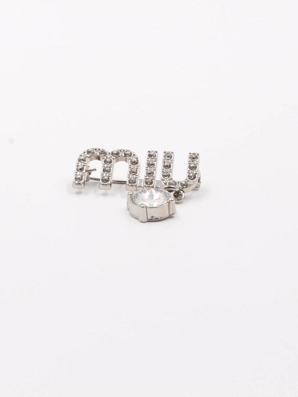 بروش ماركة ميو ميو فضي كريستال بروش miumiu فضي