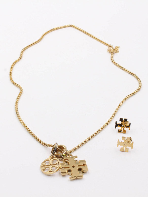 طقم توري بورش بندنت ذهبي اطقم tory burch