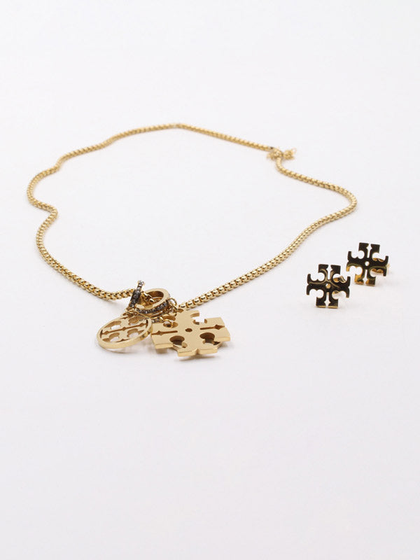 طقم توري بورش بندنت ذهبي اطقم tory burch