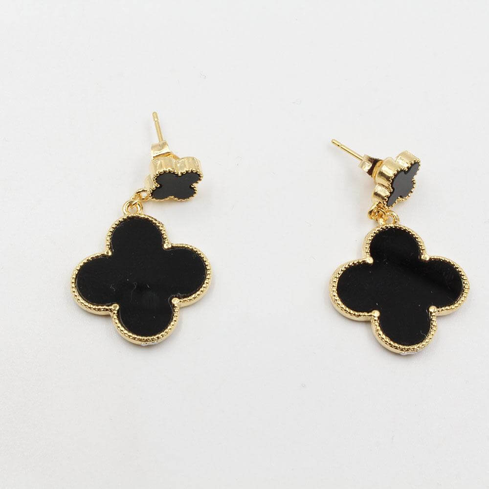 حلق فان كليف وسط وردتين حلق van cleef اسود ذهبي