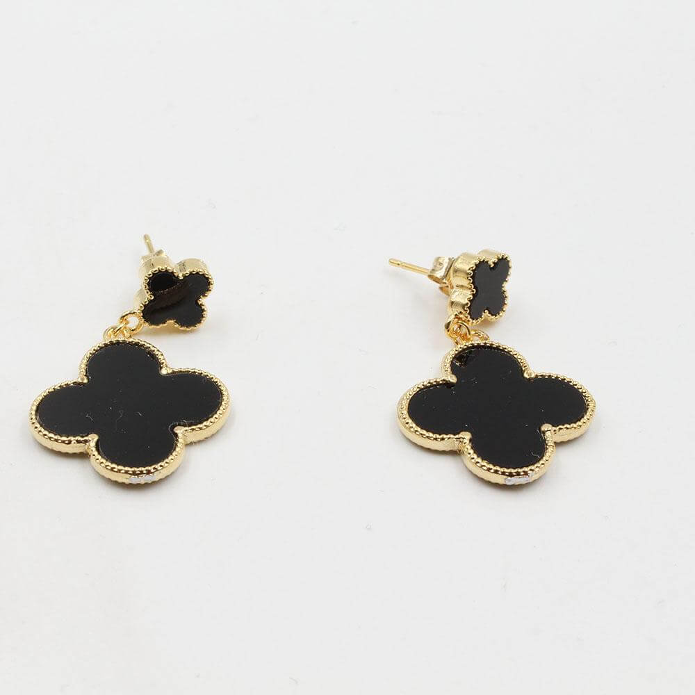 حلق فان كليف وسط وردتين حلق van cleef