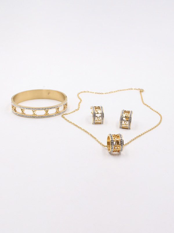 طقم لويس فيتون 3 قطع ذهبي اطقم louis vuitton