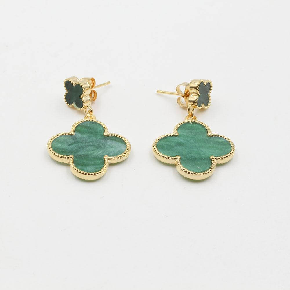 حلق فان كليف وسط وردتين حلق van cleef اخضر ذهبي