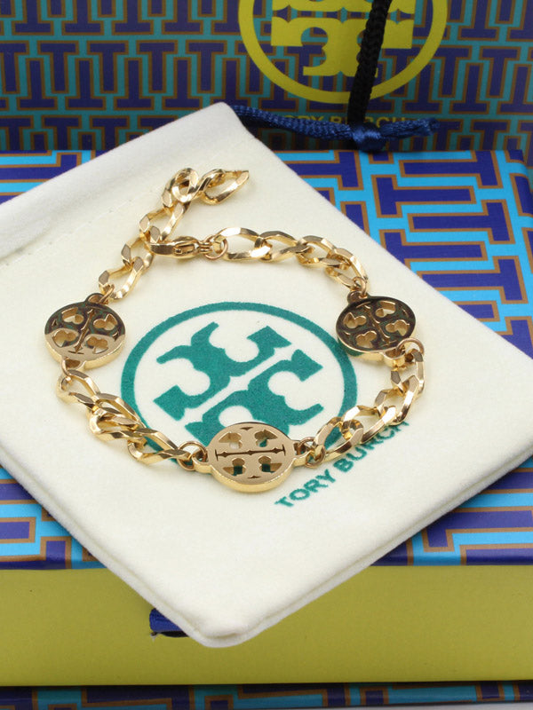 اسواره توري بورش جنزير اسواره tory burch ذهبي