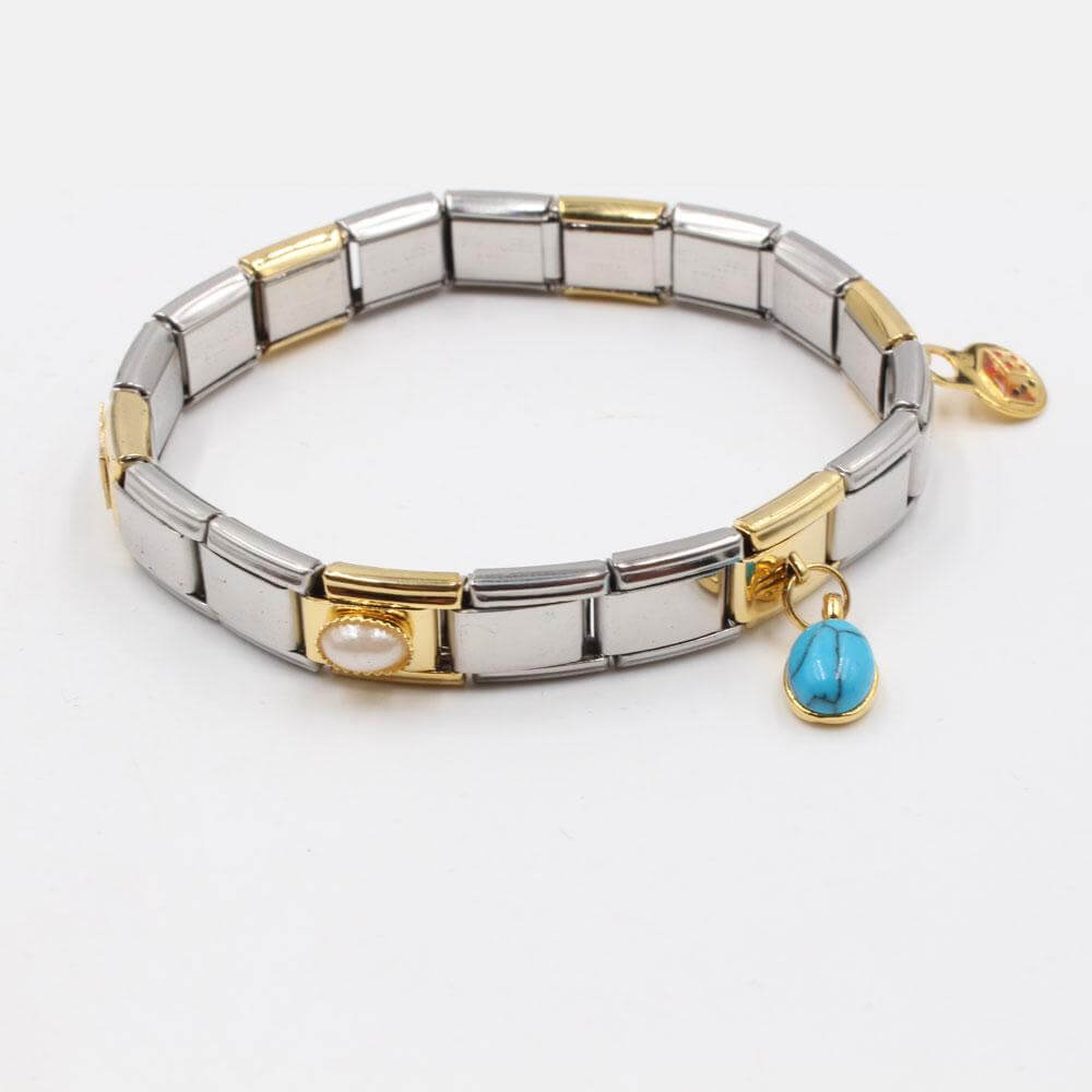 اسوارة نومنيشن ستانلس ستيل دبندنتس بحجر تركواز اسواره nomination ملون