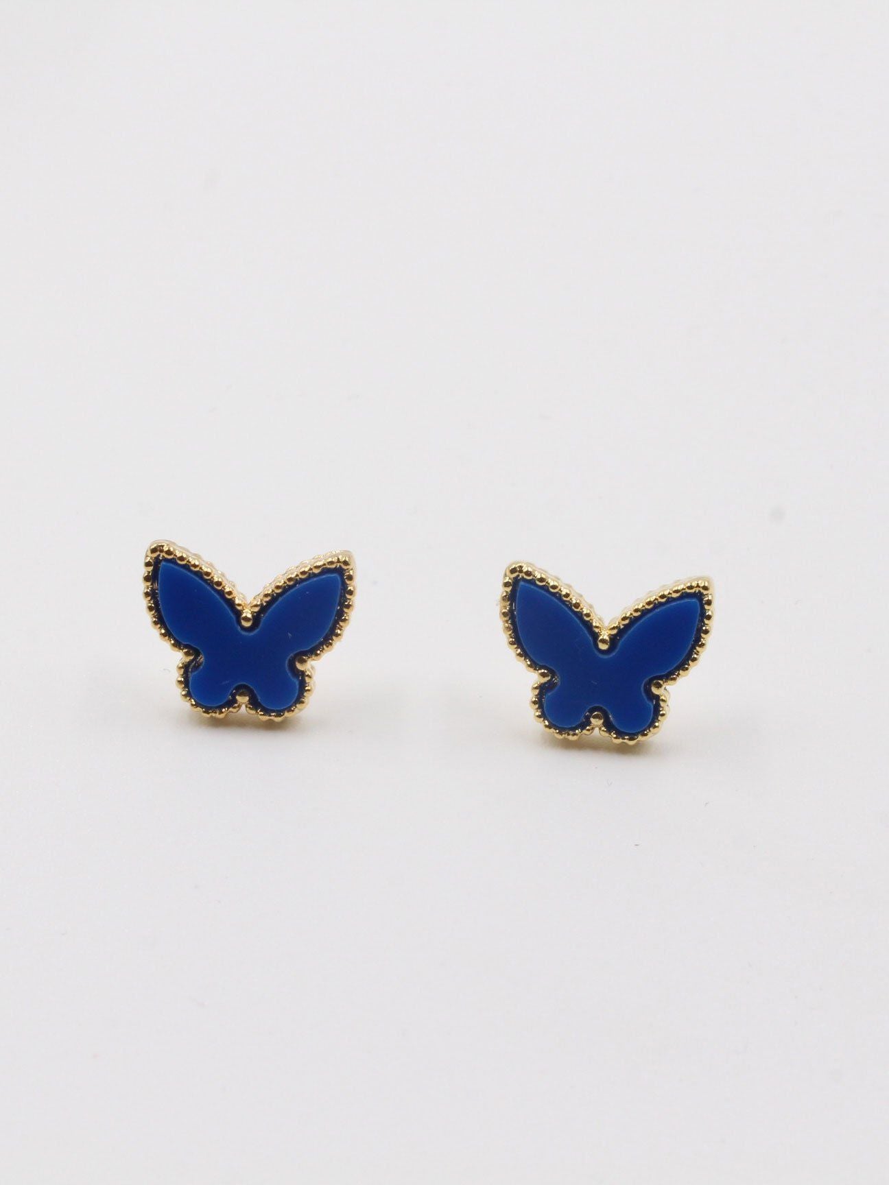 حلق فان كليف فراشة وسط حلق van cleef ازرق