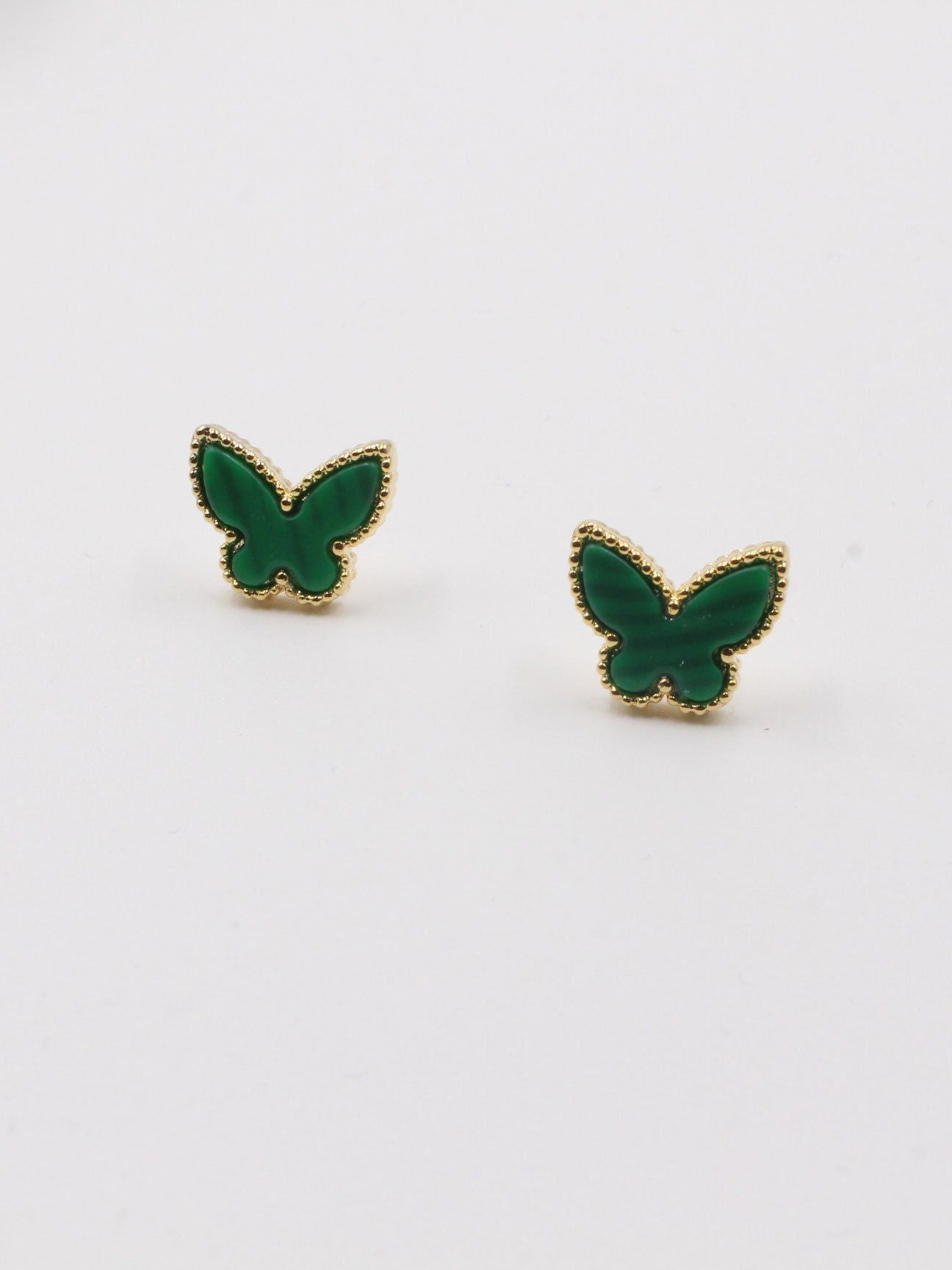 حلق فان كليف فراشة وسط حلق van cleef اخضر