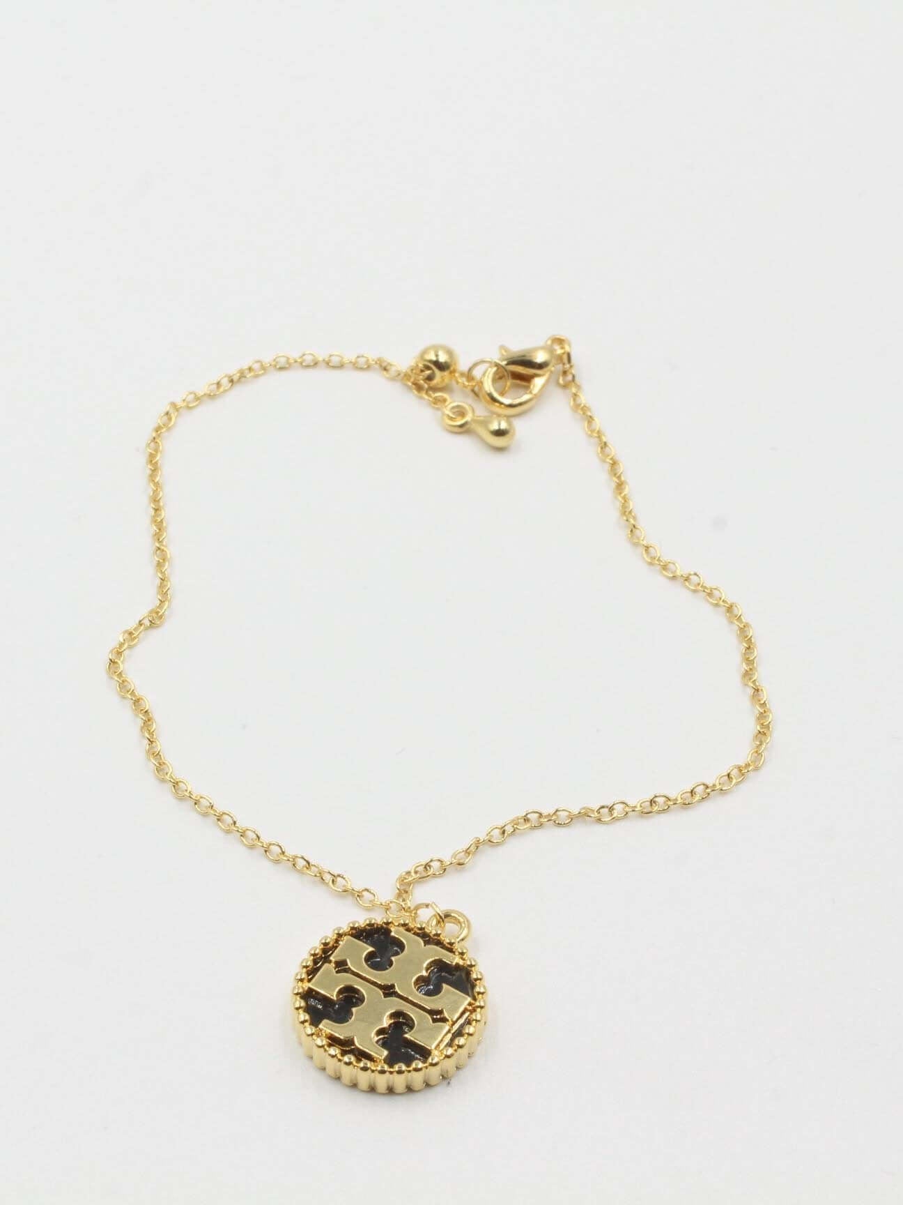 اسواره توري بورش اسواره tory burch اسود ذهبي