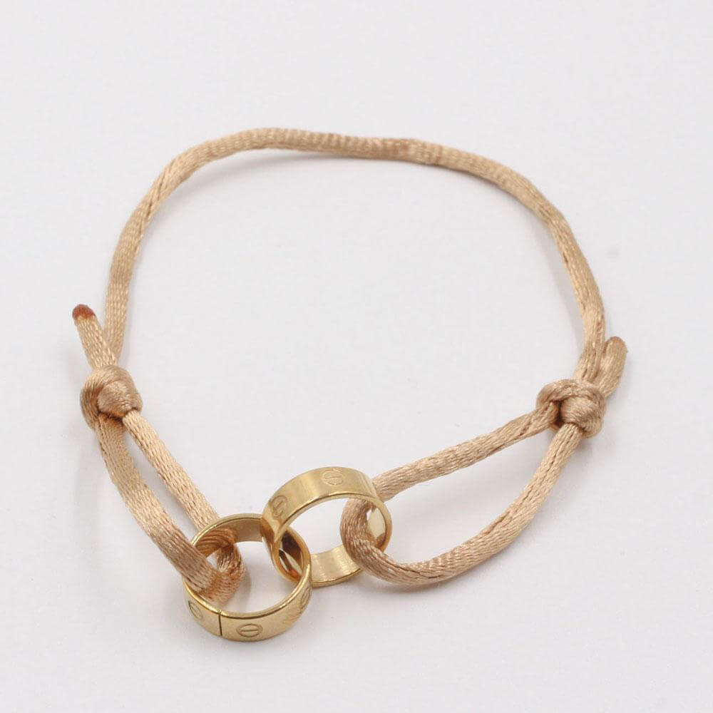 اسواره كارتير ستيل خيط وسط اسواره متوفر 5 لون بني ذهبي