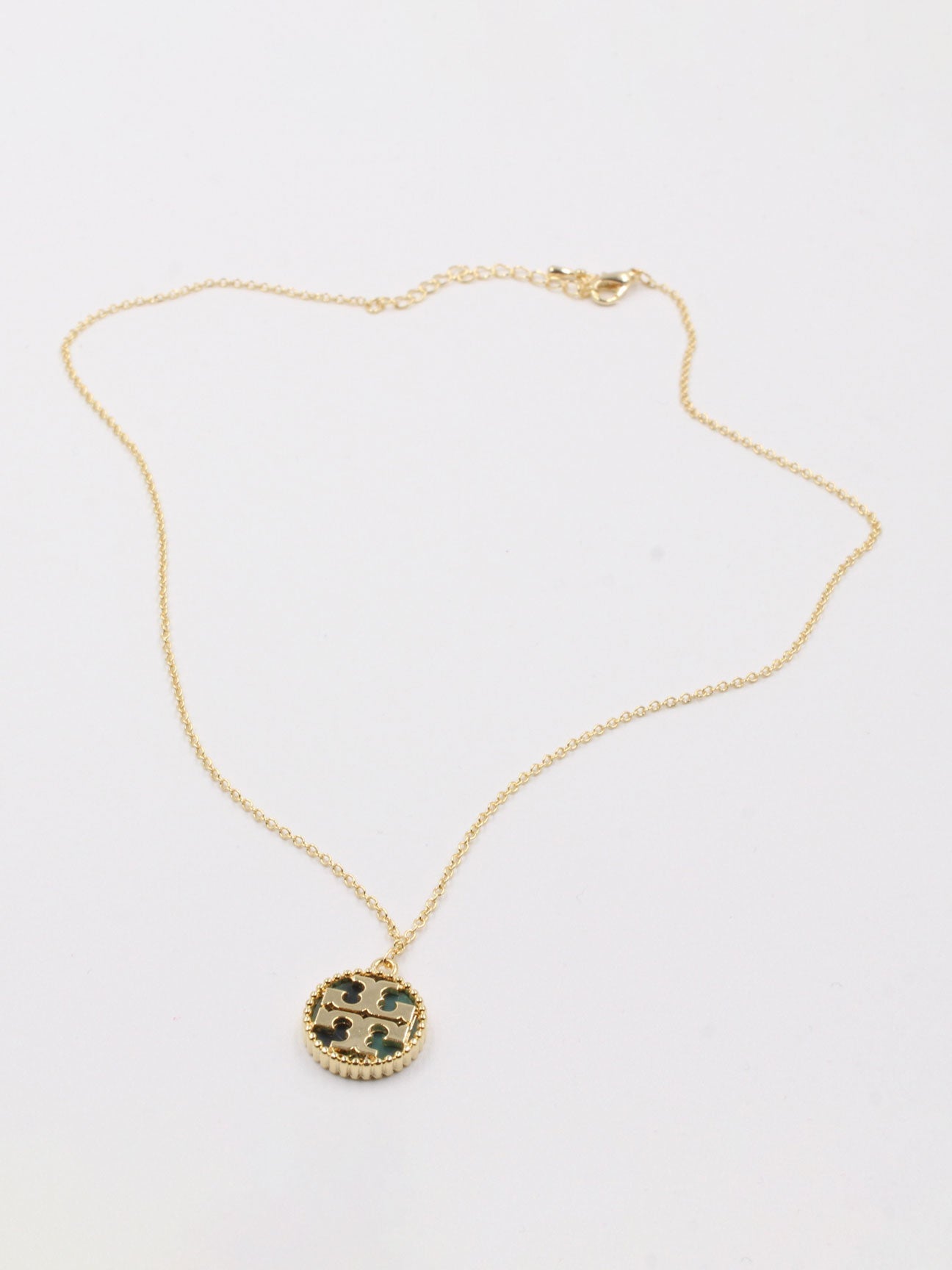 سلسال توري بورش سلسال tory burch اخضر ذهبي