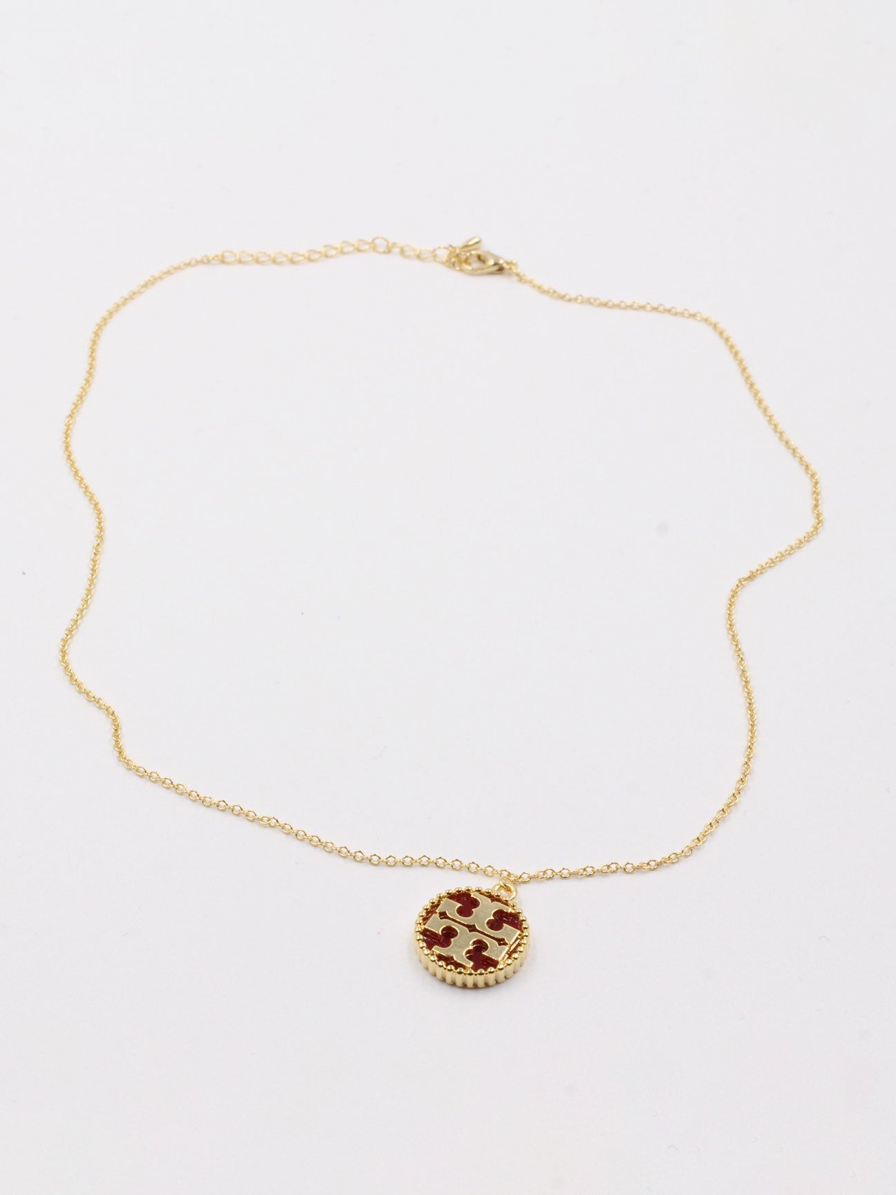 سلسال توري بورش سلسال tory burch احمر ذهبي