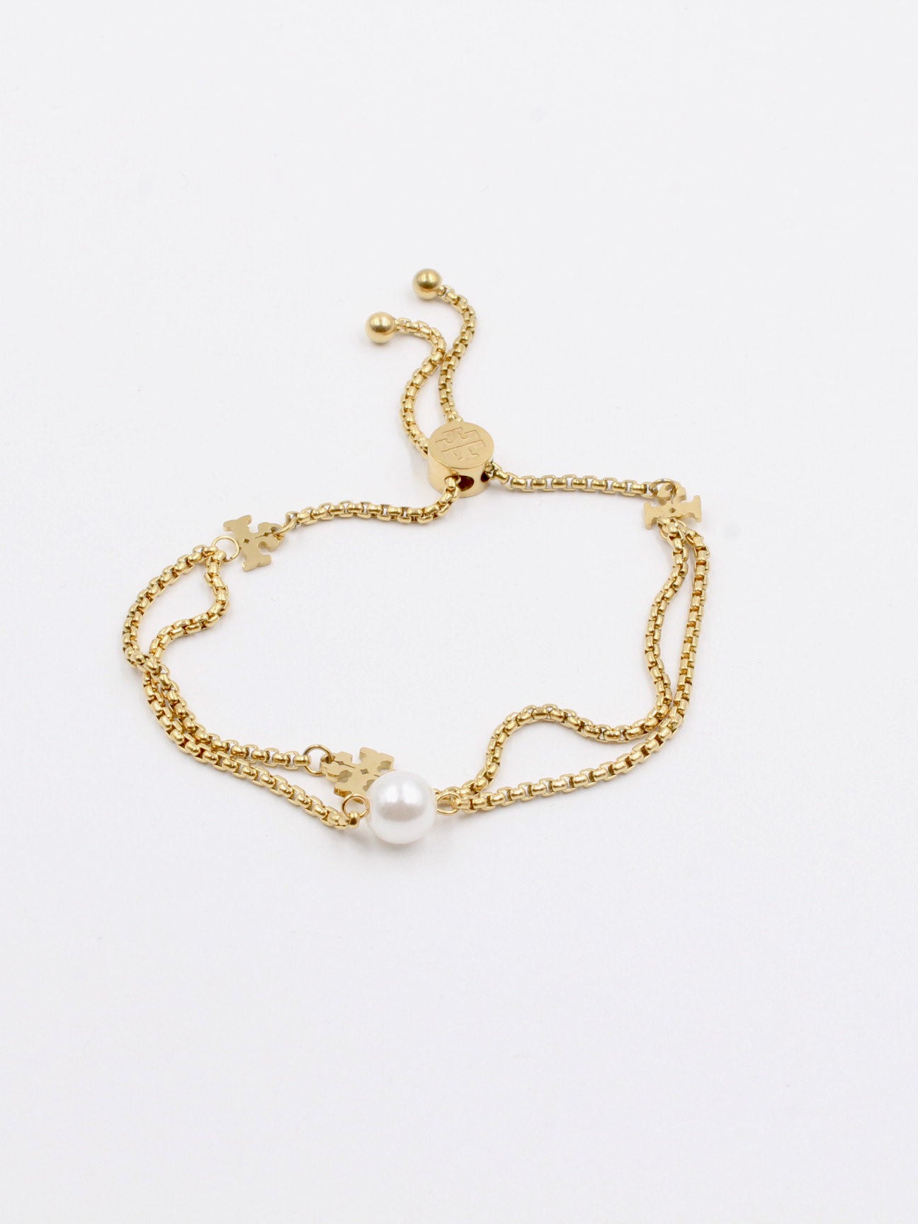 Tory Burch double layer pearl bracelet - أسوارة توري بورش لؤلؤ طبقتين اسواره tory burch ذهبي