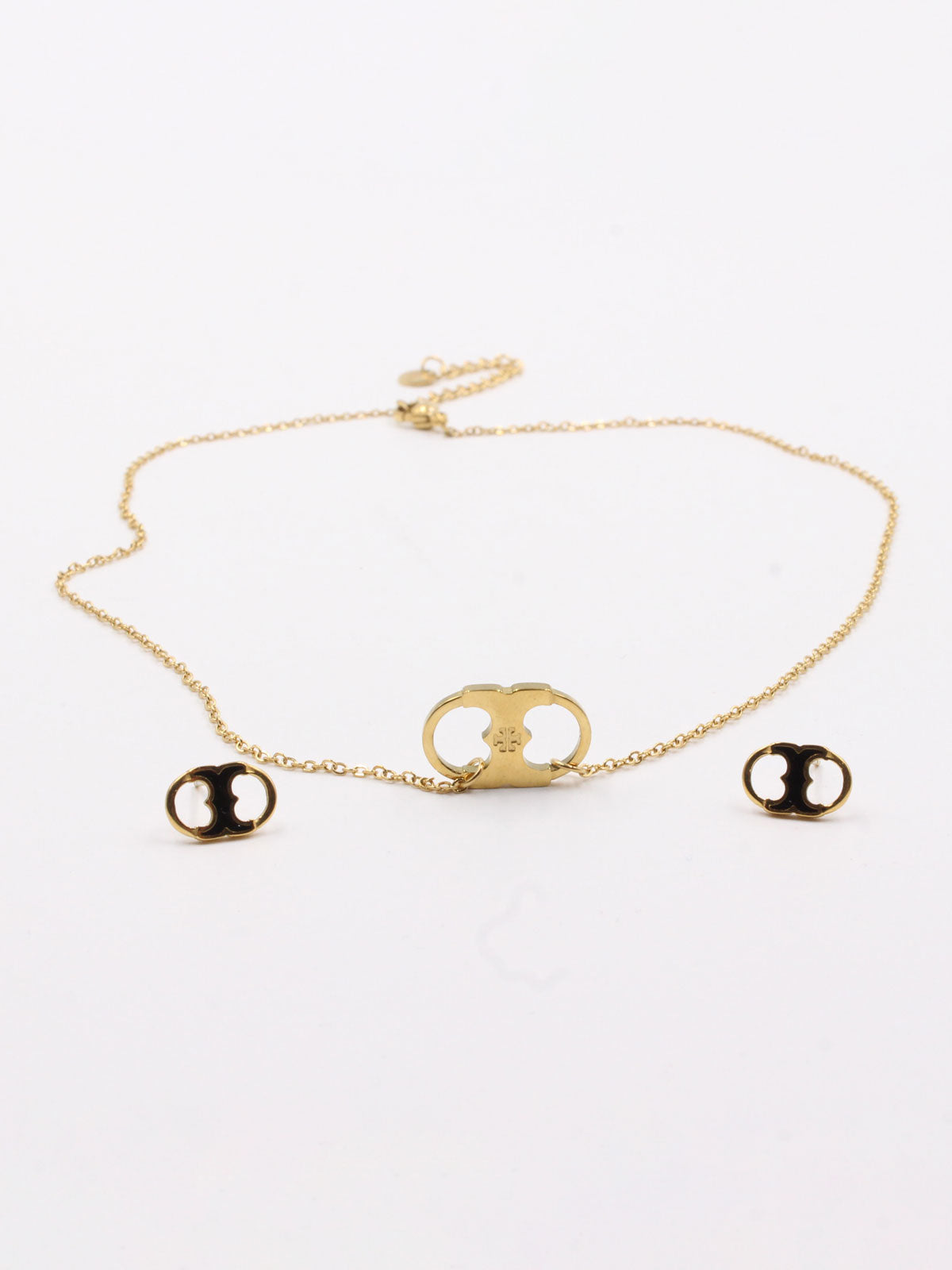 طقم توري بورش ناعم -Tory Burch Set اطقم tory burch اسود ذهبي