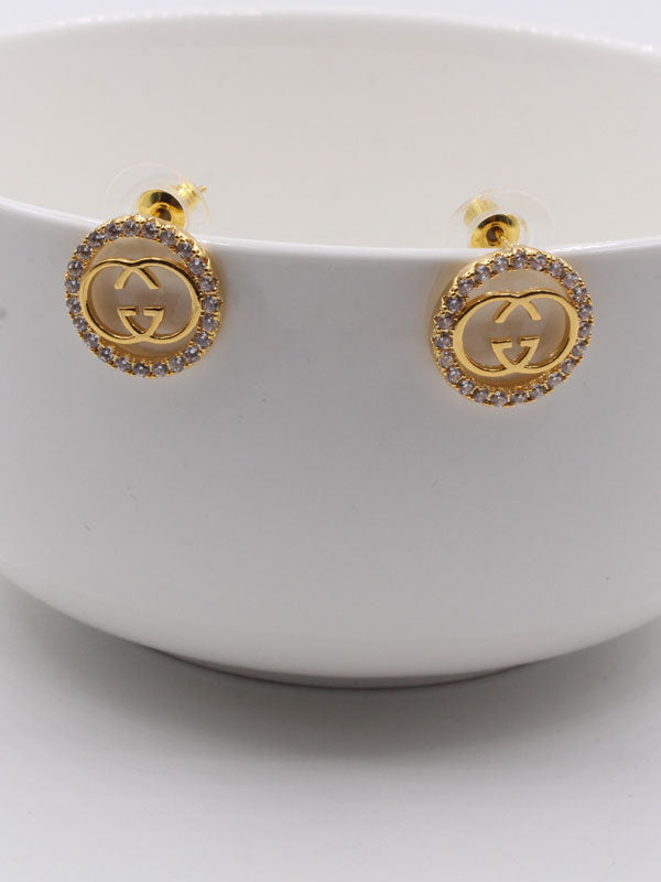 حلق قوتشي مدور زركون حلق gucci ذهبي