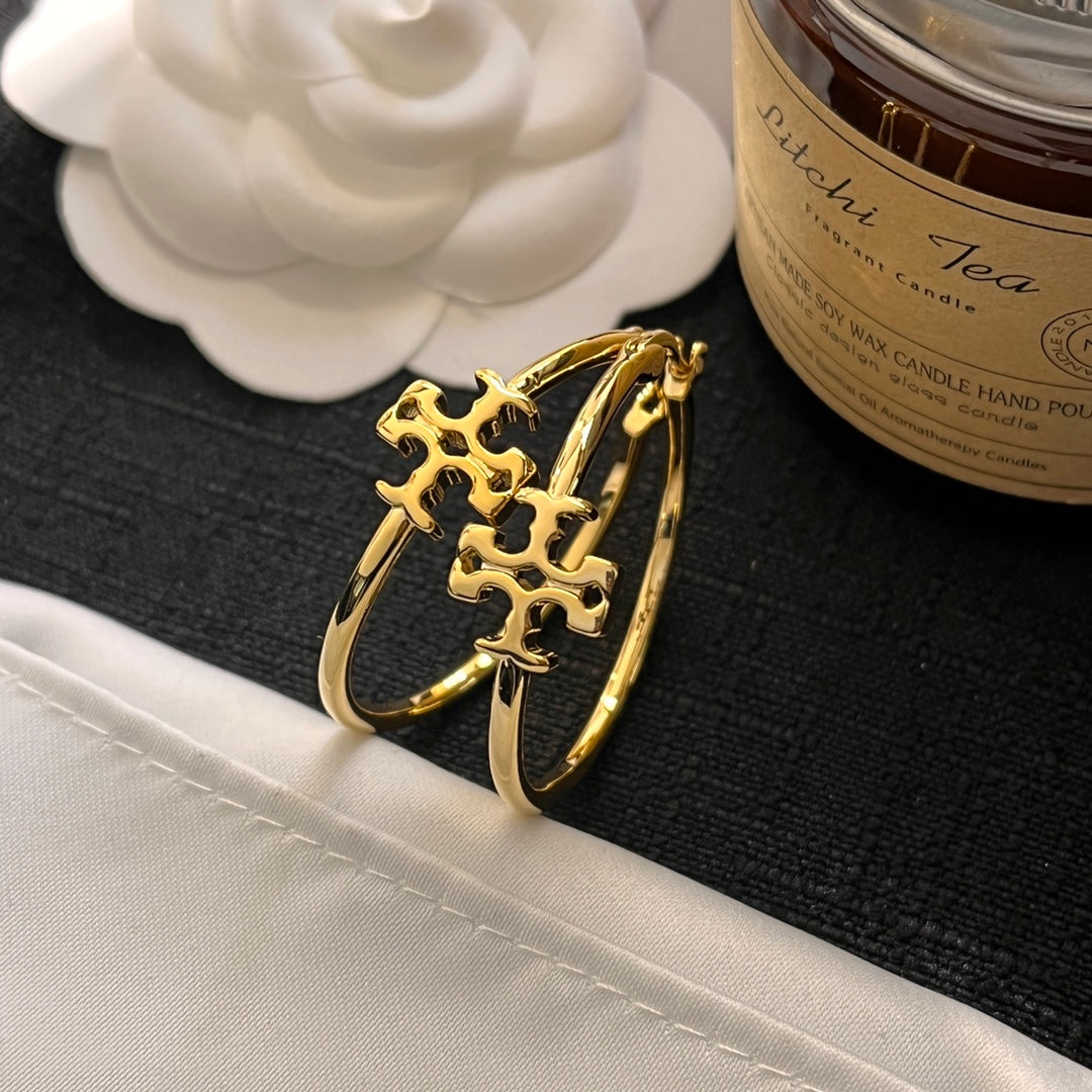 حلق توري بورش مدور كبير ميتال حلق tory burch