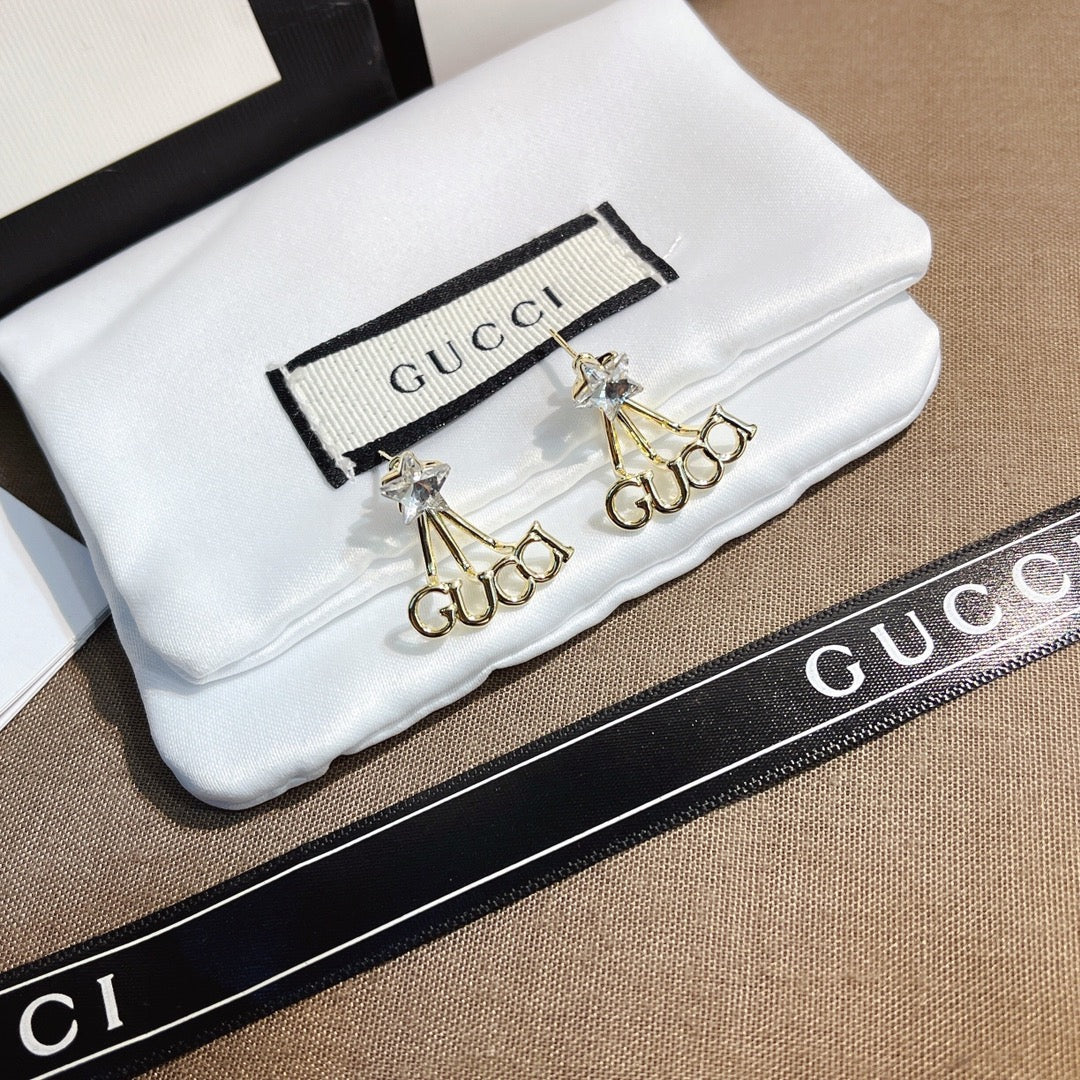 حلق قوتشي ستار سايد لوقو حلق gucci