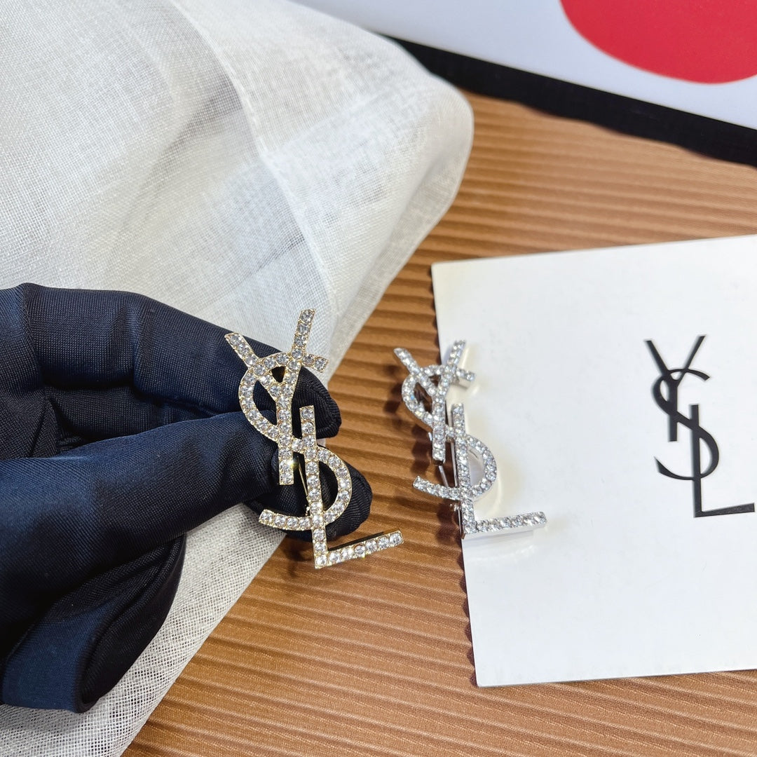 بروش ماركة ايف سان لوران كريستال بروش ysl