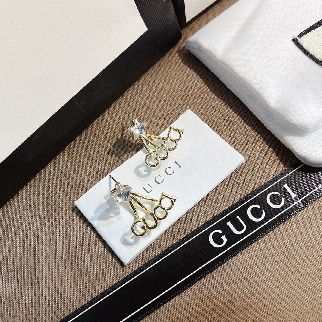 حلق قوتشي ستار سايد لوقو حلق gucci