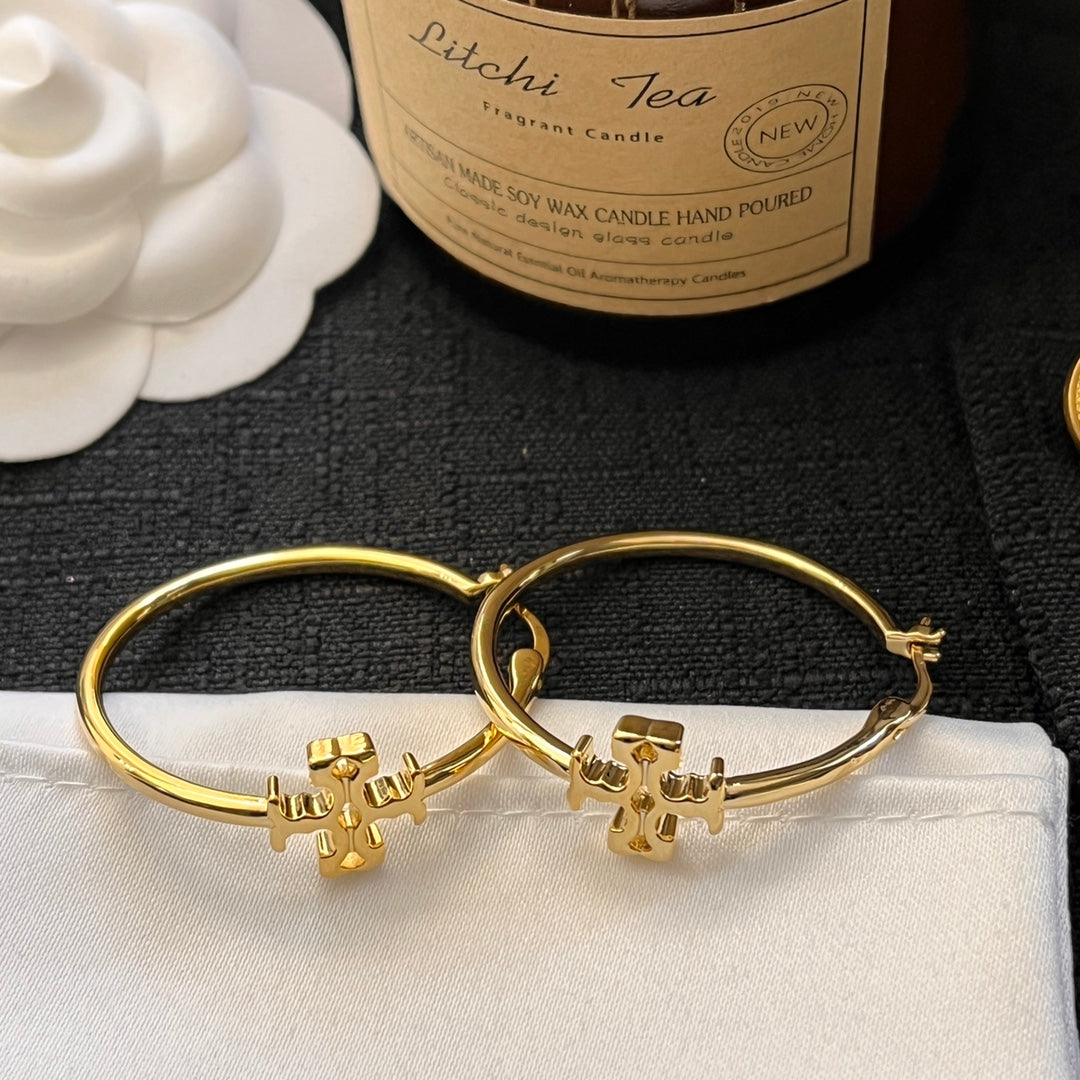 حلق توري بورش مدور كبير ميتال حلق tory burch