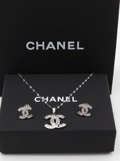 طقم شانيل زركون لوقو اطقم chanel فضي