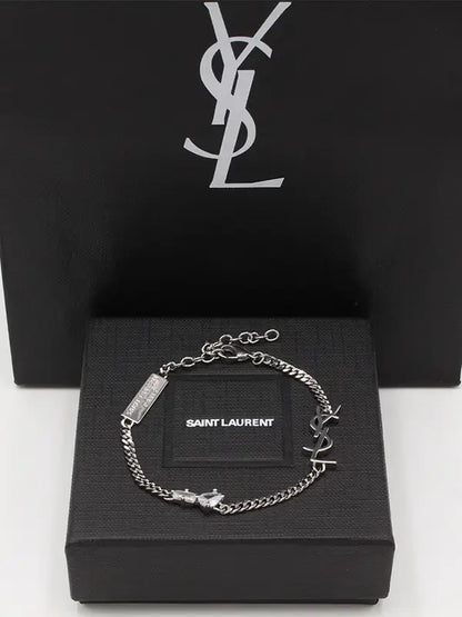 اسوارة ايف سان لوران زركون لوقو اسواره ysl ذهبي