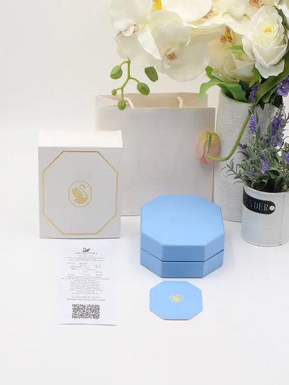 ملحقات سواروفسكي للاطقم بلو وايت هدايا Swarovski