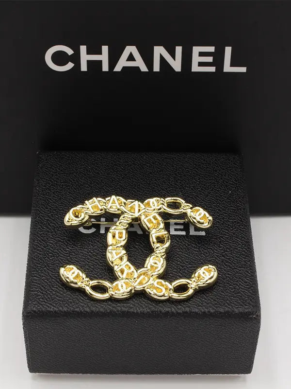 بروش شانيل ميتال لوقو 219 بروش chanel