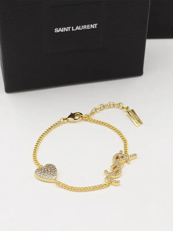 اسوارة ايف سان لوران كريستال لوقو اسواره ysl ذهبي