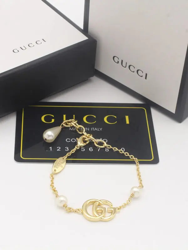 اساور قوتشي لولو لوقو اسواره gucci ذهبي