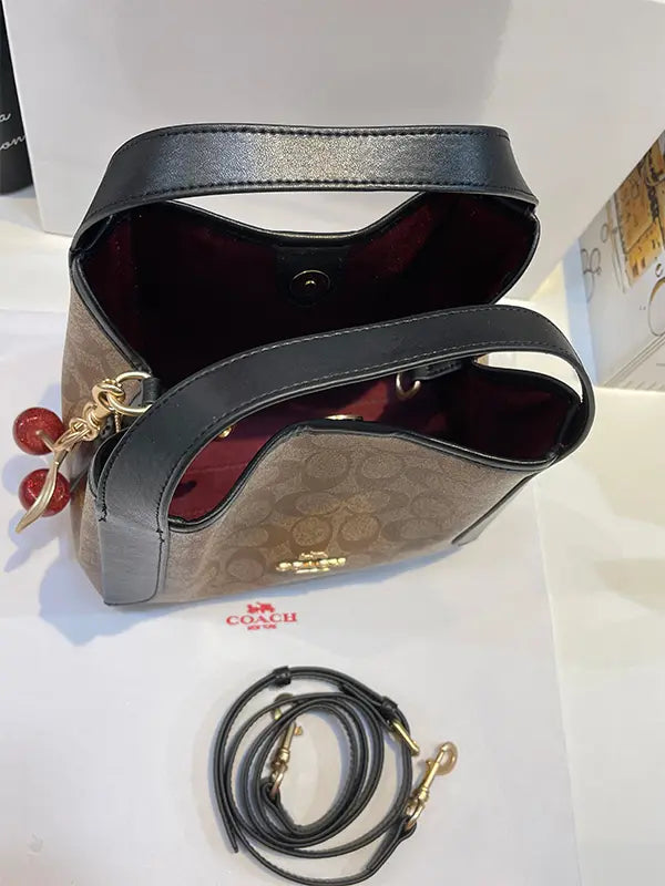 شنطة كوتش بنية شنط وحقائب coach bags