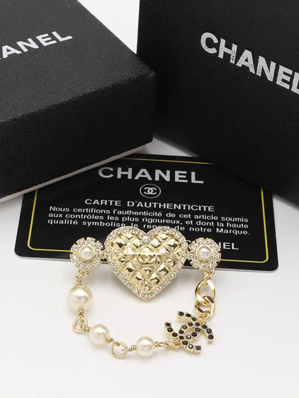 بروش شانيل الجديد 249 بروش chanel ذهبي