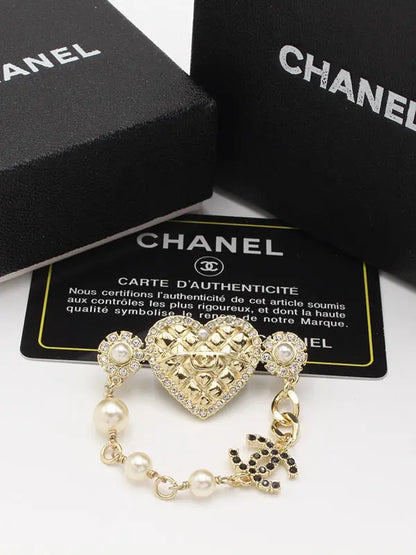 بروش شانيل الجديد 249 بروش chanel ذهبي