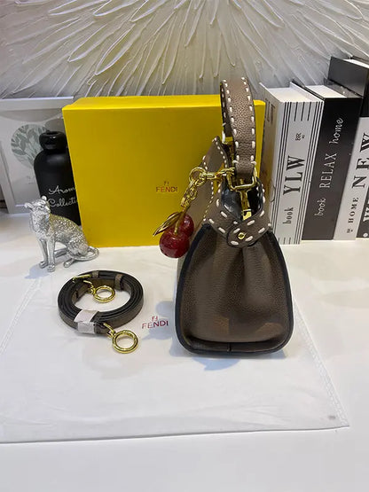 شنطة فندي بنية بتعليقه كرز شنط وحقائب fendi bags