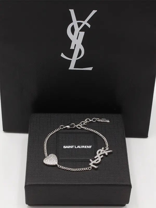 اسوارة ايف سان لوران كريستال لوقو اسواره ysl فضي