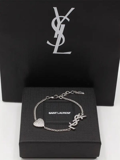 اسوارة ايف سان لوران كريستال لوقو اسواره ysl فضي