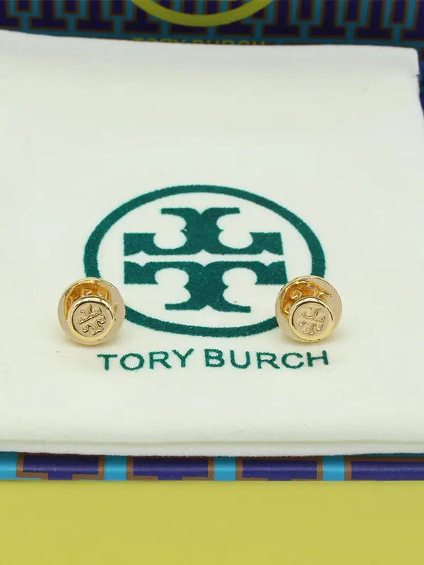 حلق توري بورش ميتال صغير لوقو حلق tory burch ذهبي