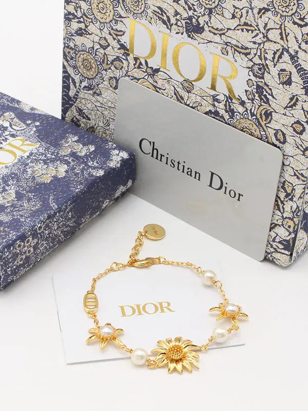 اساور ديور ماستر دوار الشمس اسواره dior ذهبي
