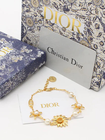 اساور ديور ماستر دوار الشمس اسواره dior ذهبي