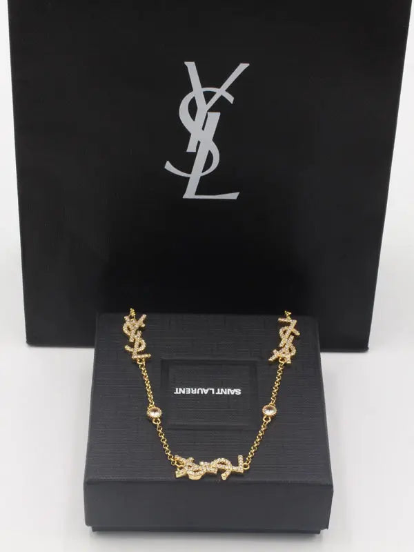 سلسال ايف سان لوران زركون لوقو سلسال ysl