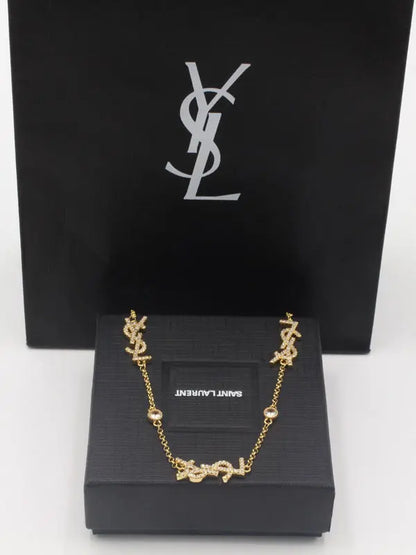 سلسال ايف سان لوران زركون لوقو سلسال ysl