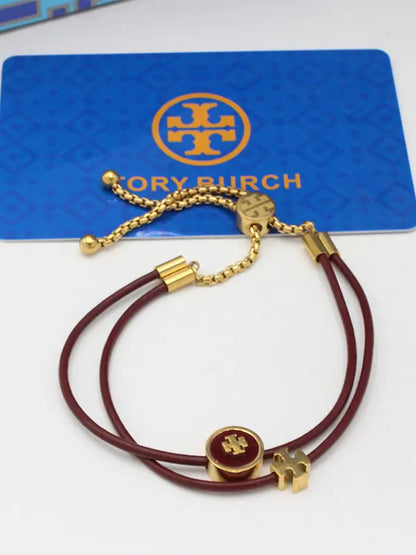 اساور توري بورش دبل لاينز ROPE اسواره tory burch عنابي ذهبي
