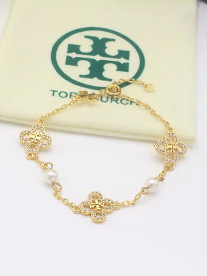 اسواره توري بورش 865 اسواره tory burch ذهبي