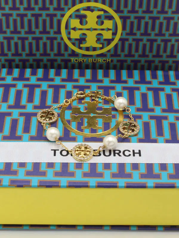 اسواره توري بورش 862 اسواره tory burch ذهبي