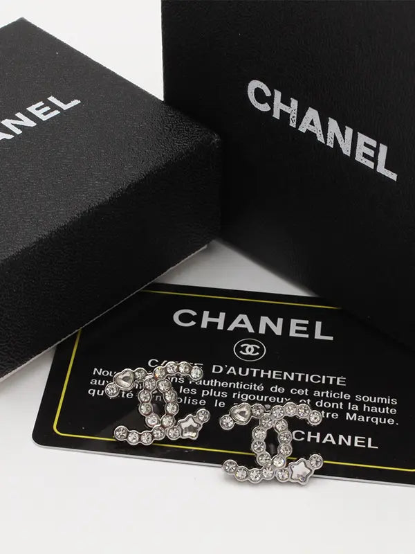 حلق شانيل 572 حلق chanel فضي
